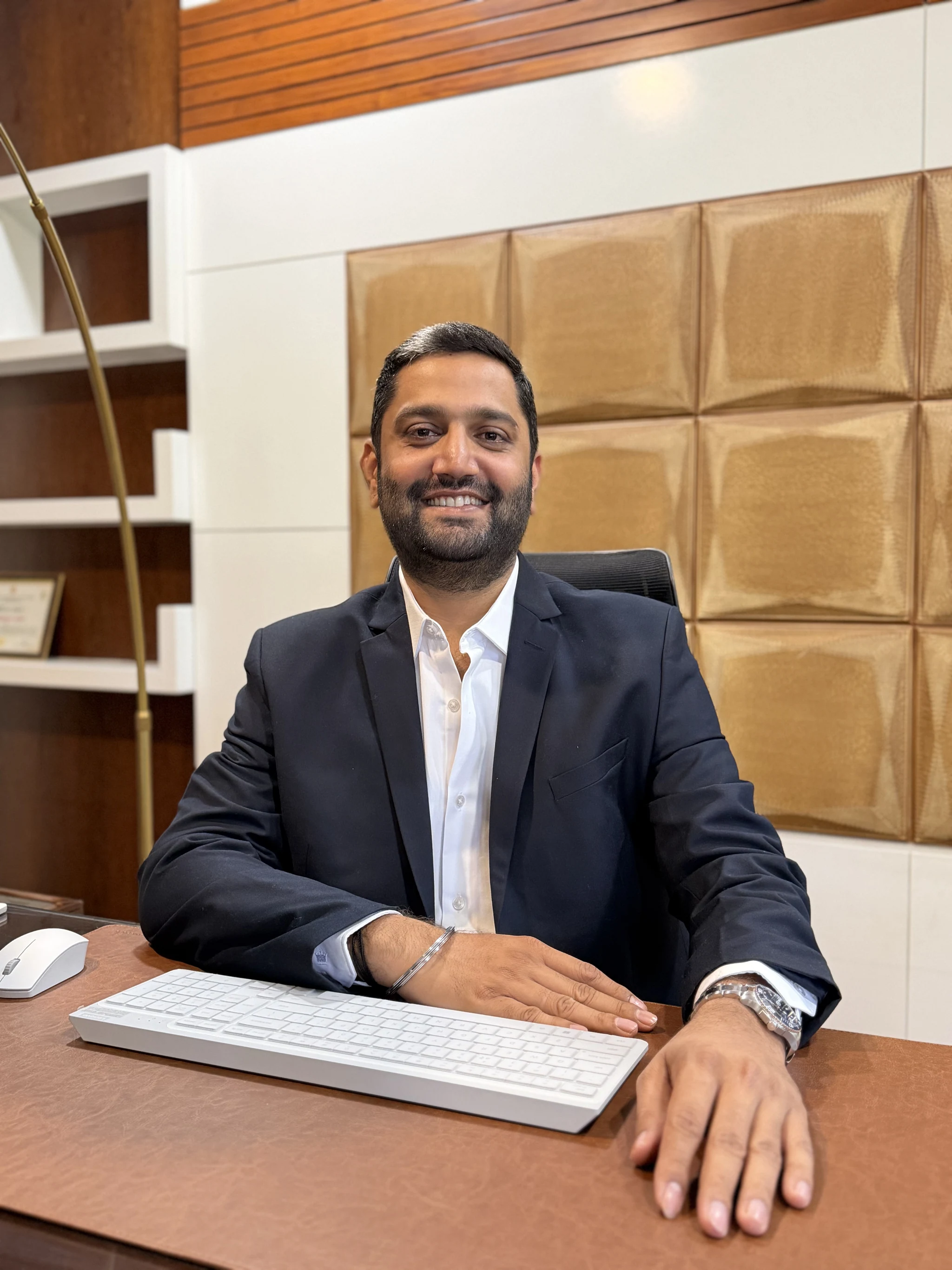 Choyal leader seated at his desk